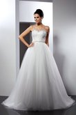 Robe de mariée longue distinguee de traîne mi-longue en tulle bretelles spaghetti