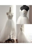 Robe de mariée dos nu longueur mollet de col en cœur haut bas textile en tulle