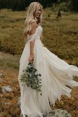 Robe de mariée en plage ruché absorbant longueur au ras du sol romantique