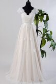 Robe de mariée avec manche courte avec zip en tulle avec manche épeules enveloppants ligne a