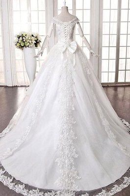 Robe de mariée manche nulle décolleté dans le dos avec perle de sirène avec broderie